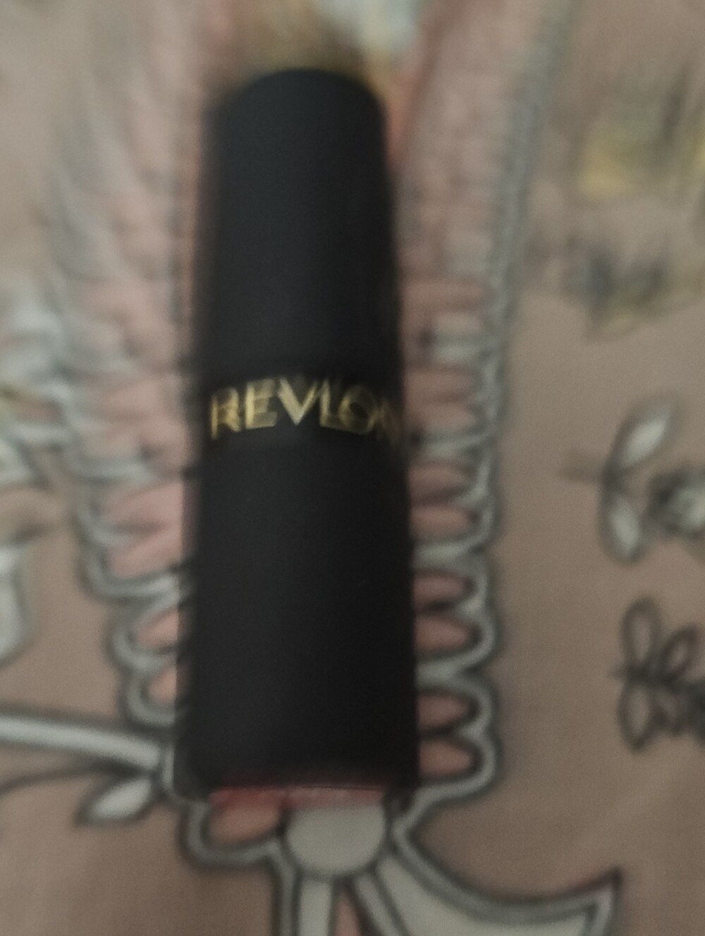 Revlon Black Lipstick Tube with Gold Logo